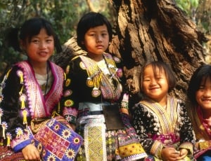 four girls in tribal suit thumbnail