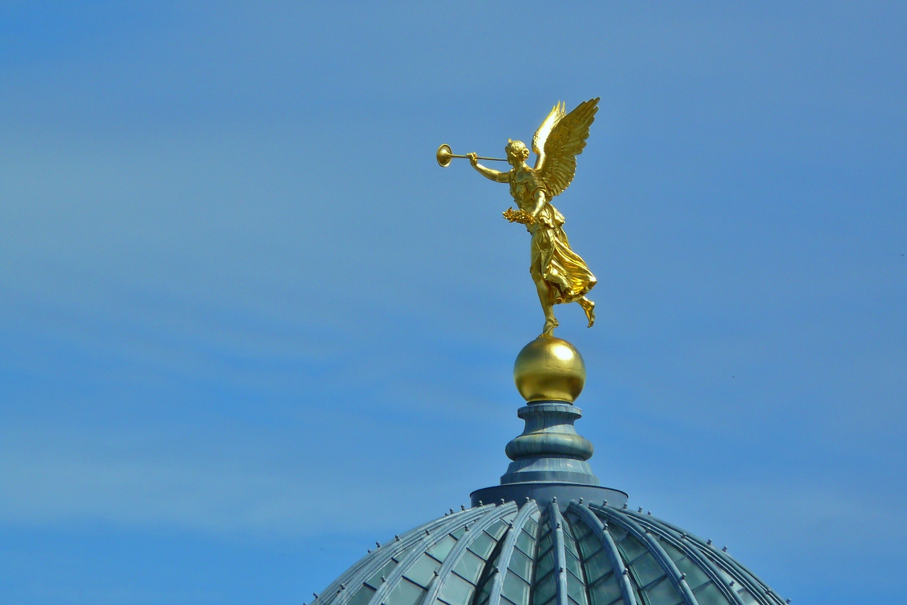 brass angel with trombone statuette