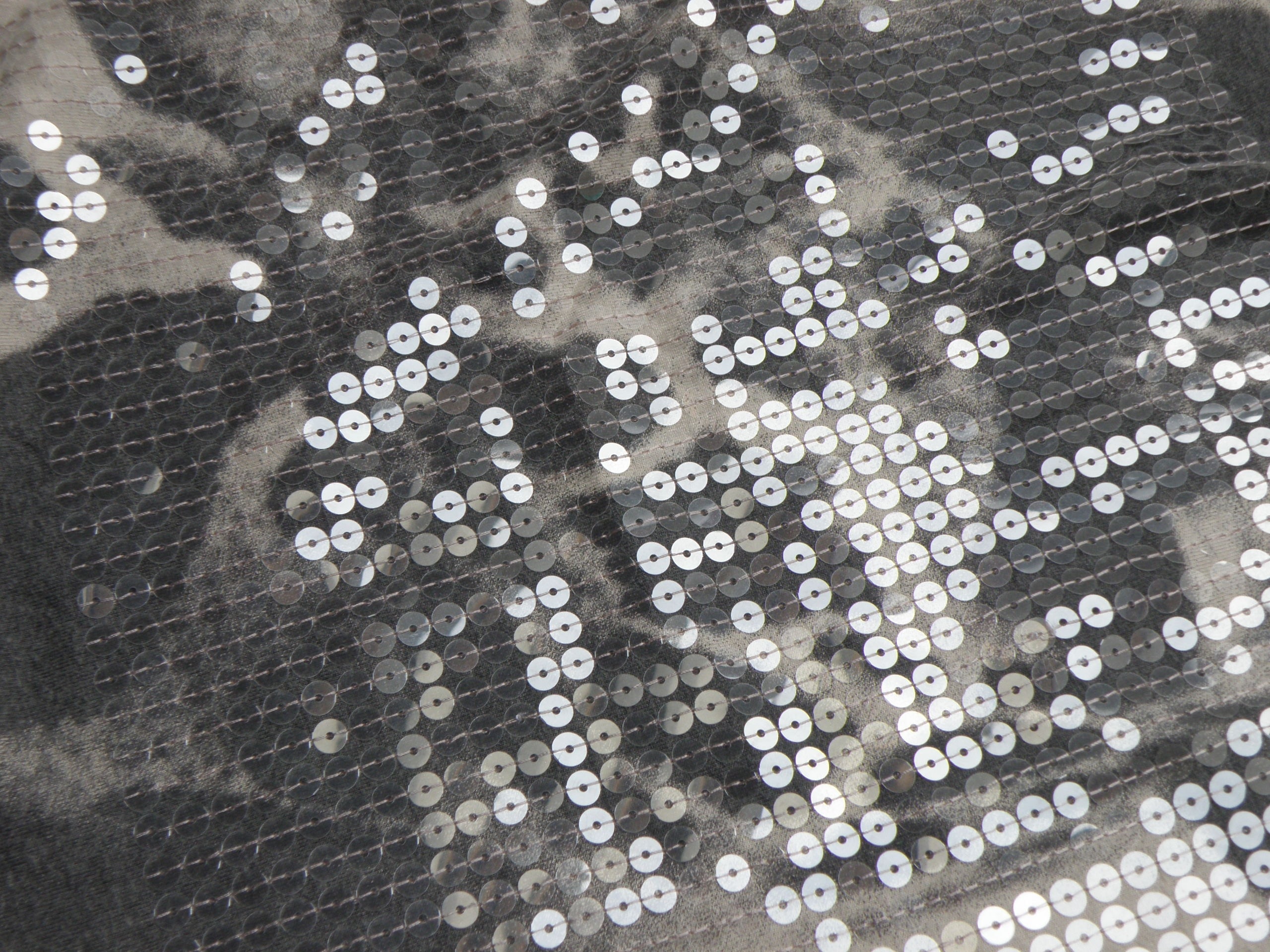 black and silver sequin textile