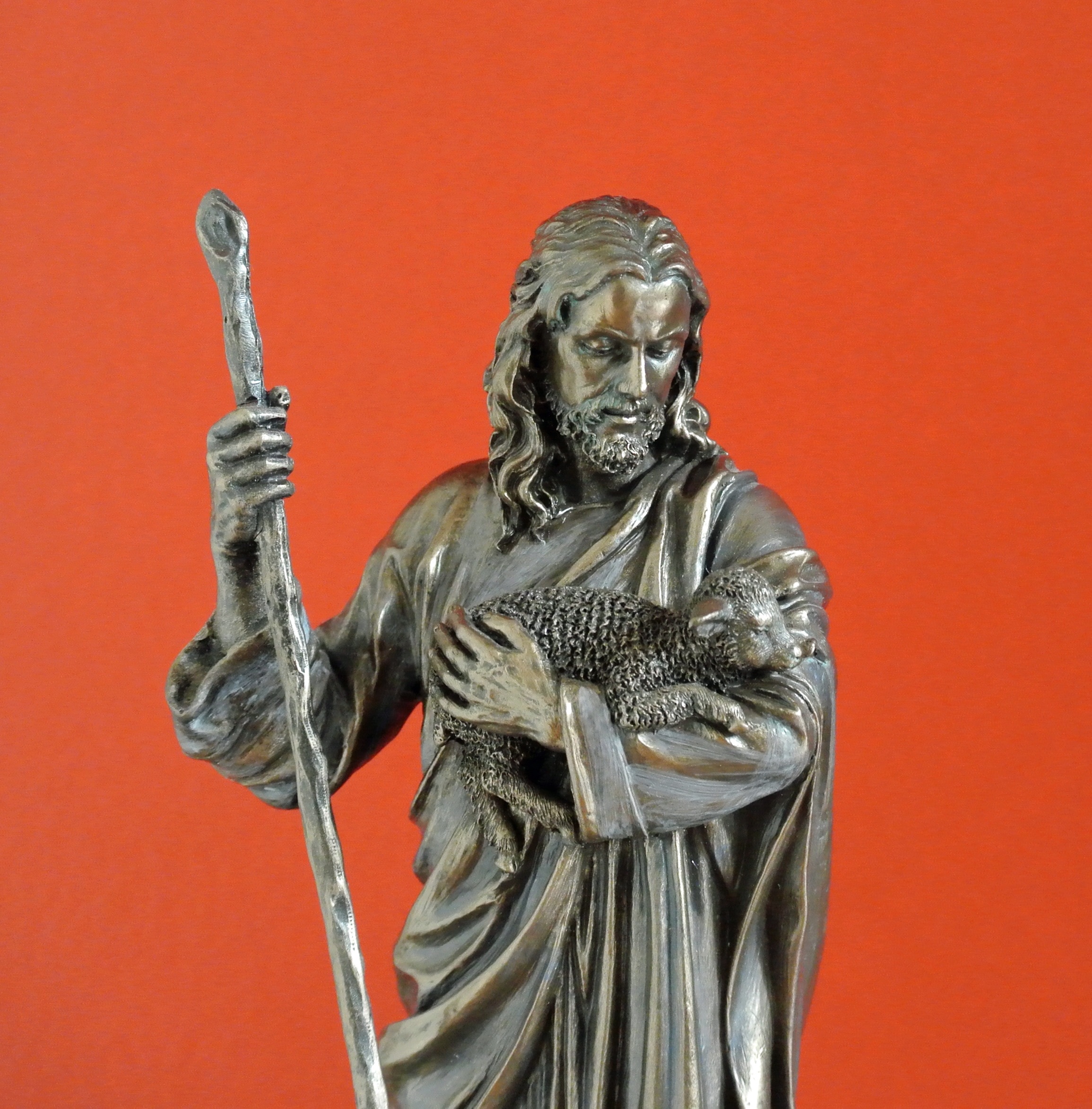 jesus carrying sheep metal figurine