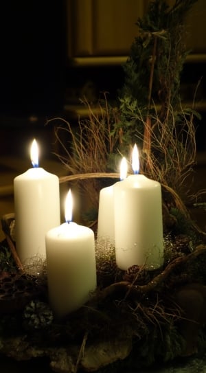 4 white pillar candles thumbnail
