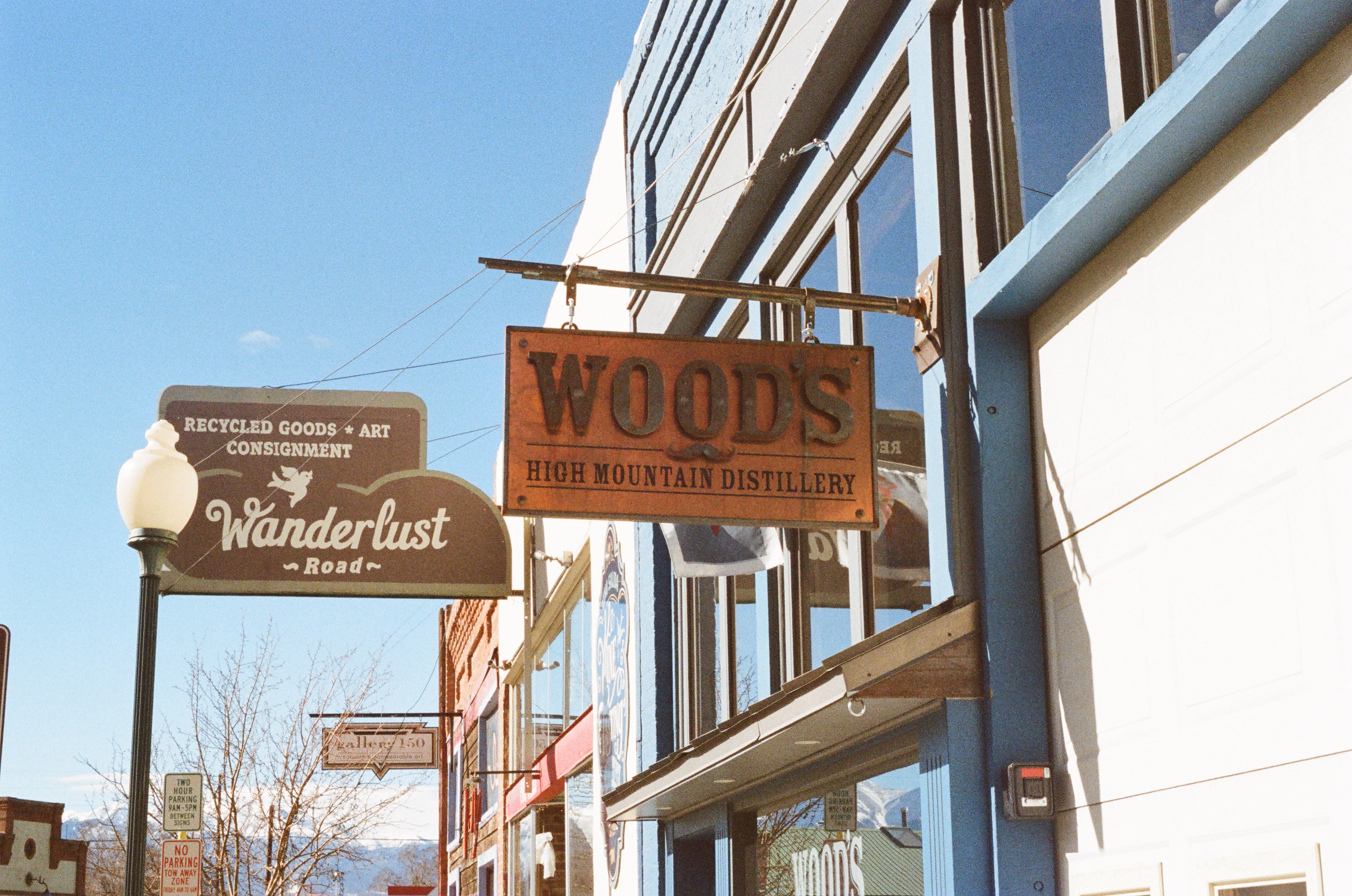 woods high mountain distillery signboard