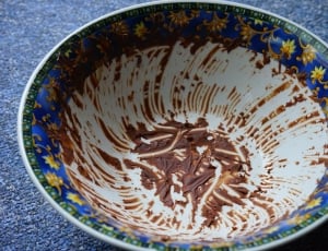 blue white and yellow flower print ceramic bowl with chocolate thumbnail