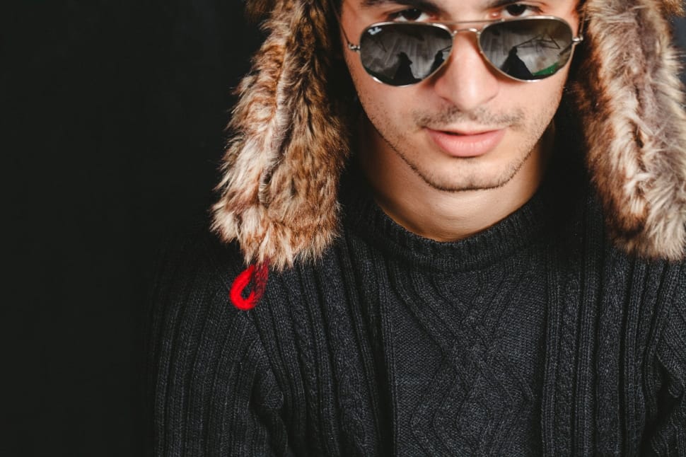 man in black sweater wearing ray ban gold frame aviator sunglasses portrait photography preview