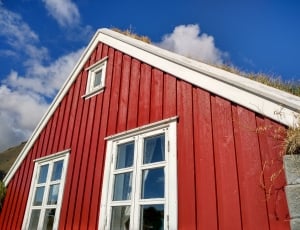 white and red wooden house thumbnail