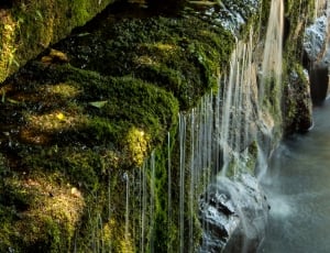 water falls between rocks thumbnail