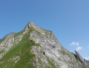 green and grey bifold peak mountain thumbnail