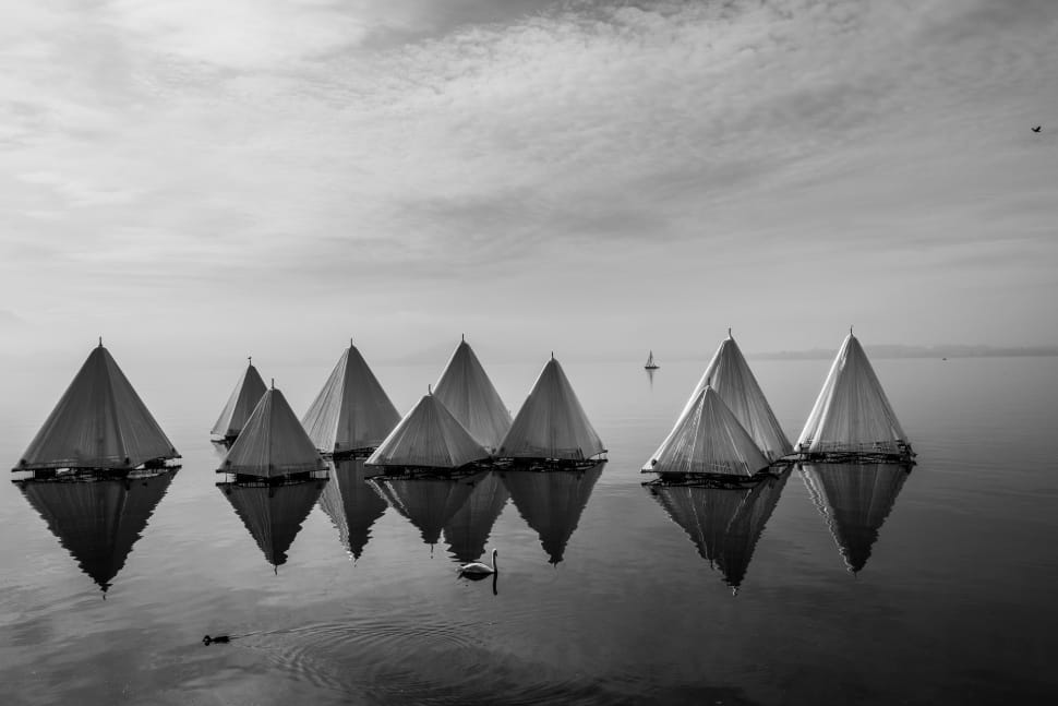 white triangular floating tents preview