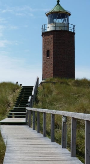 brown and white concrete lighthouse thumbnail