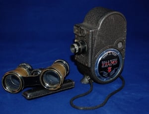 brown and black vintage binoculars thumbnail