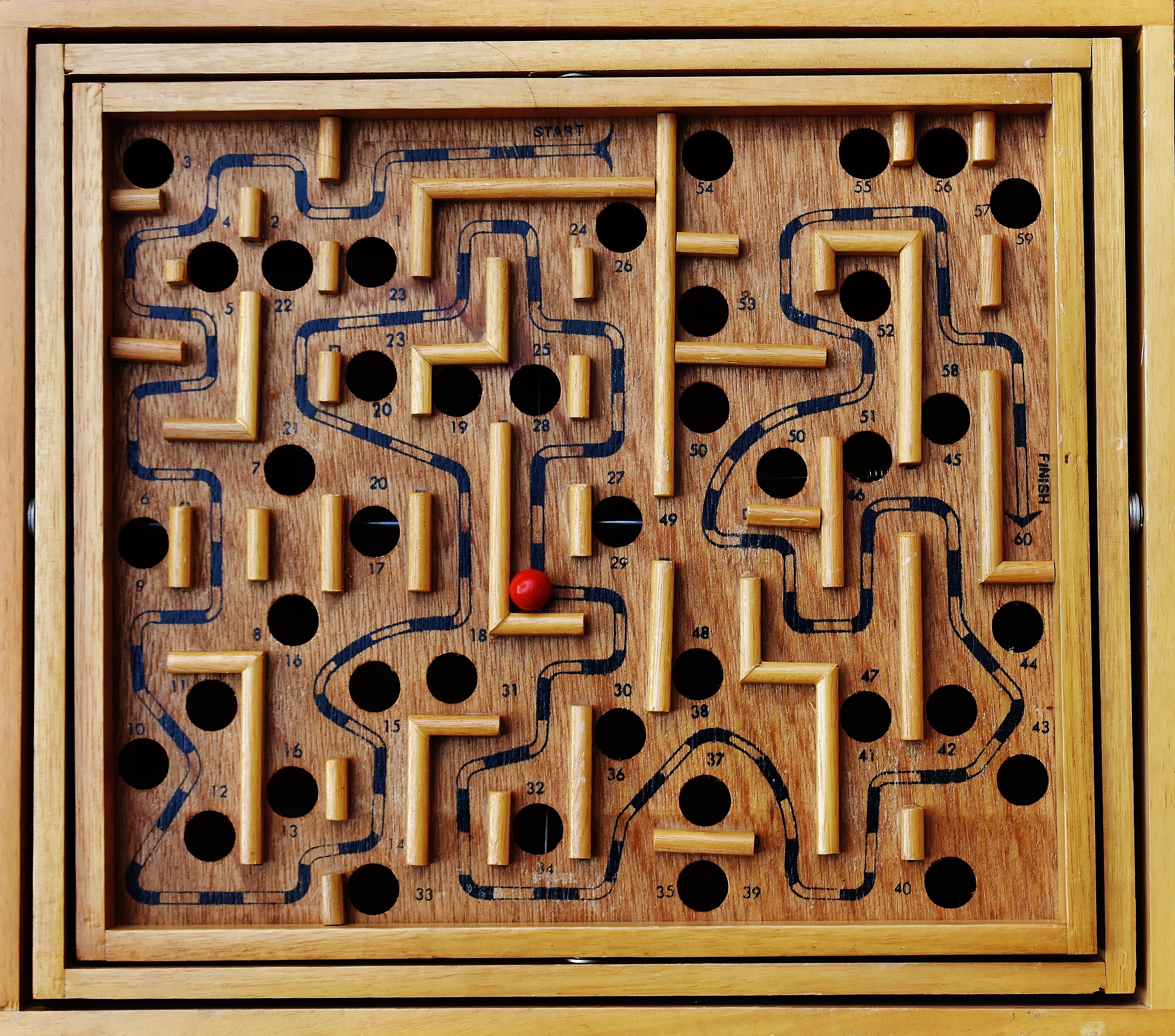 brown wooden maze frame