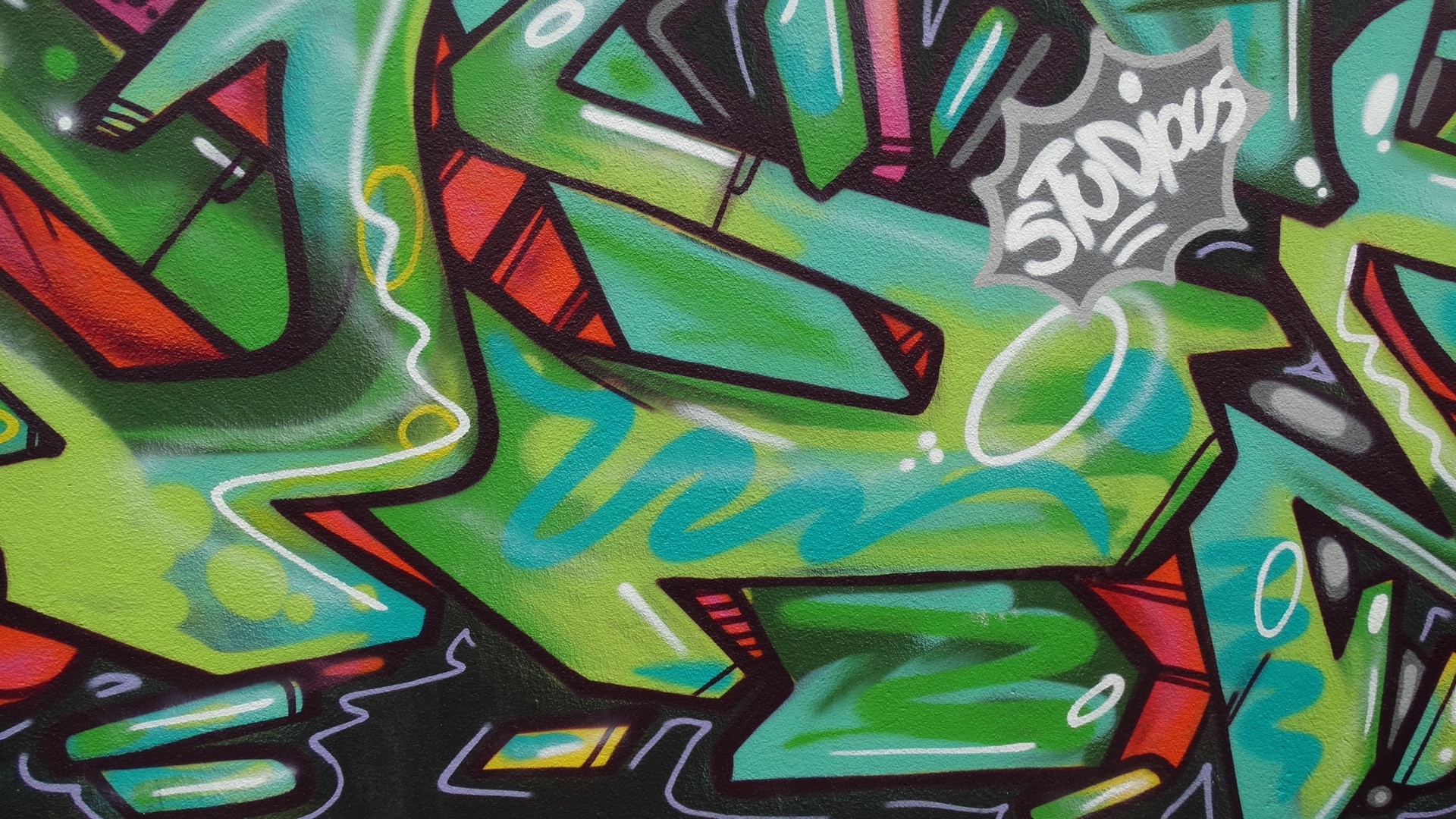 green red and black wall graffiti