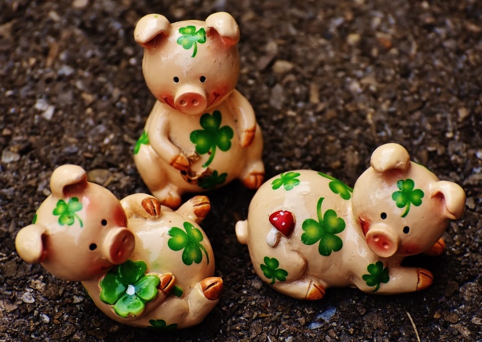3 brown and green floral pig ceramic figurines preview