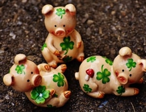 3 brown and green floral pig ceramic figurines thumbnail