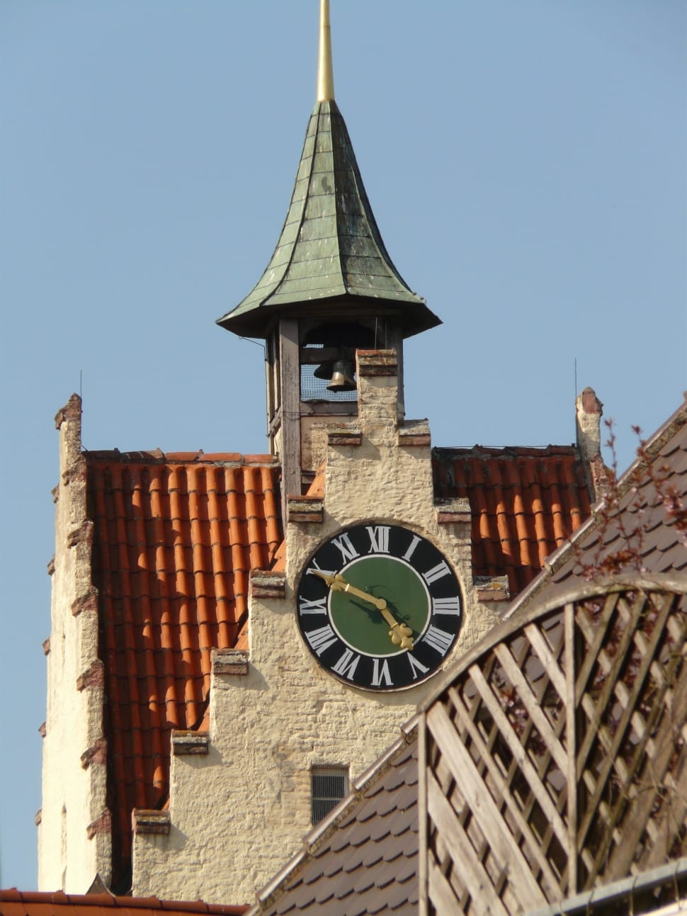green brown and orange clock tower preview