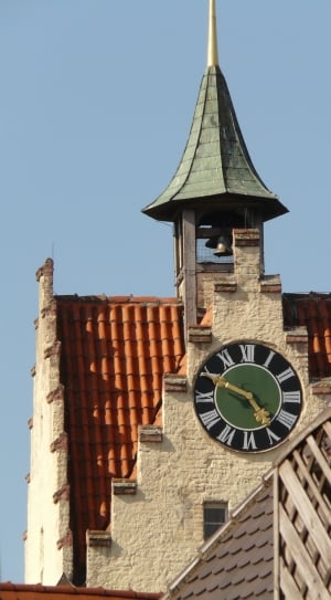 green brown and orange clock tower thumbnail