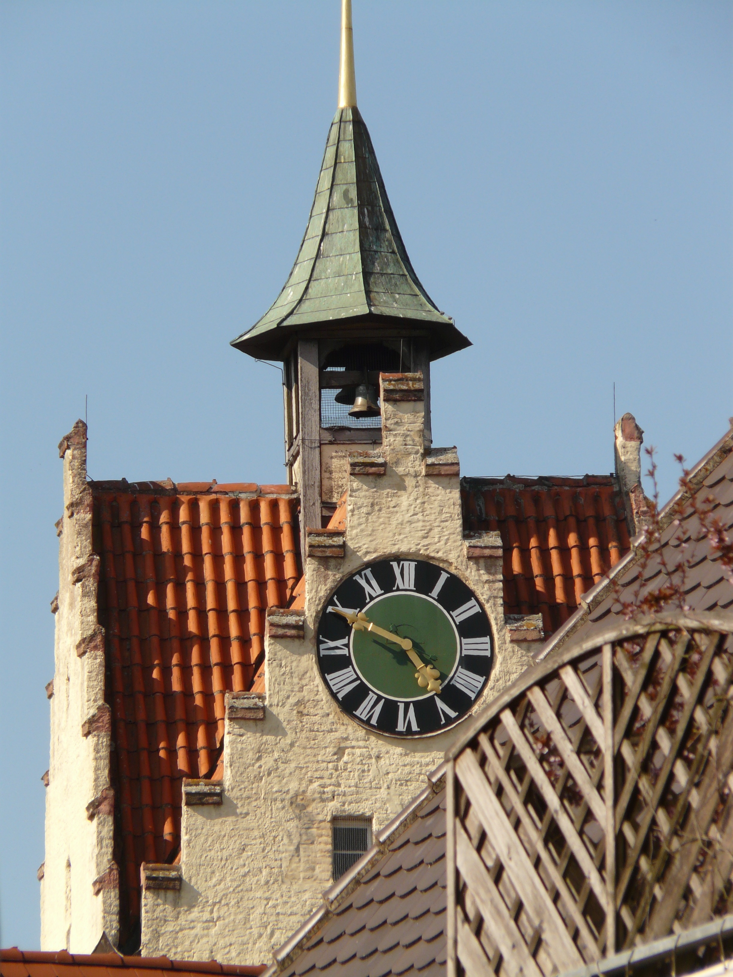 green brown and orange clock tower