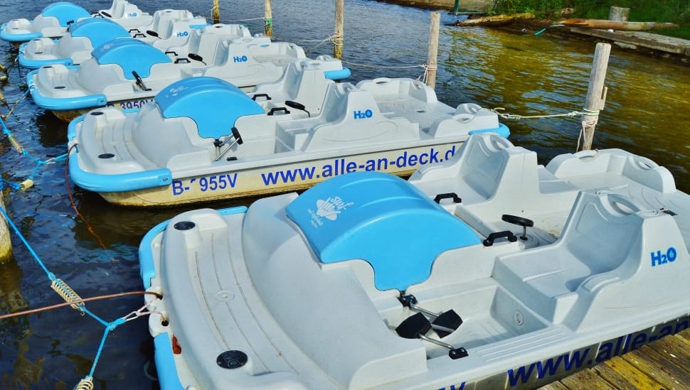 white and blue water craft preview