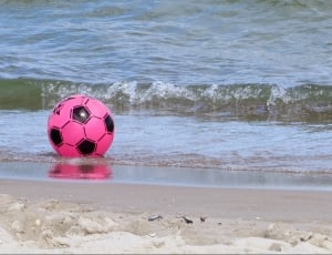 black and pink soccer ball thumbnail