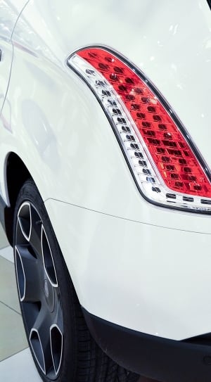 red and white car headlight thumbnail