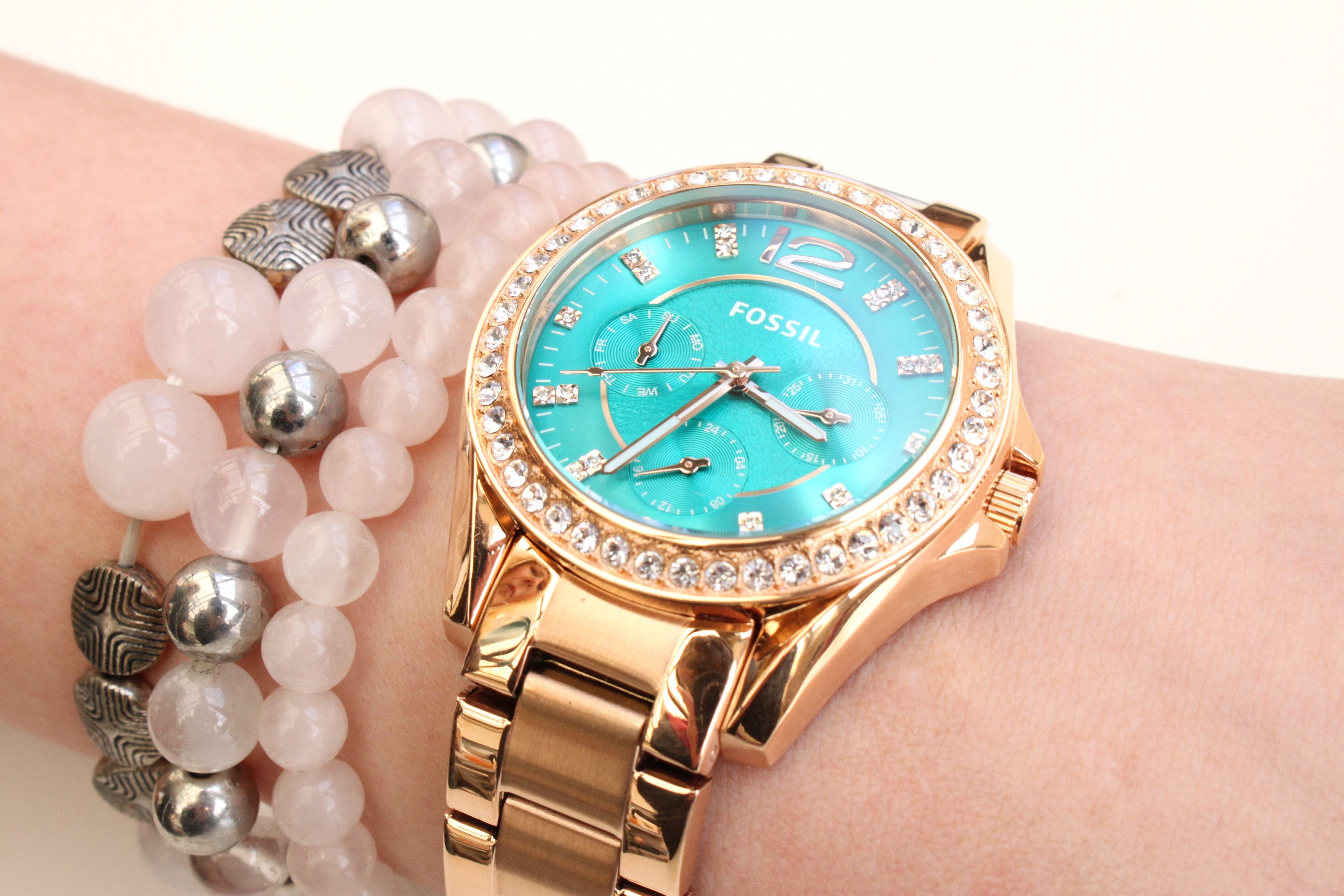 women's gold plated blue face fossil chronograph watch and bracelet
