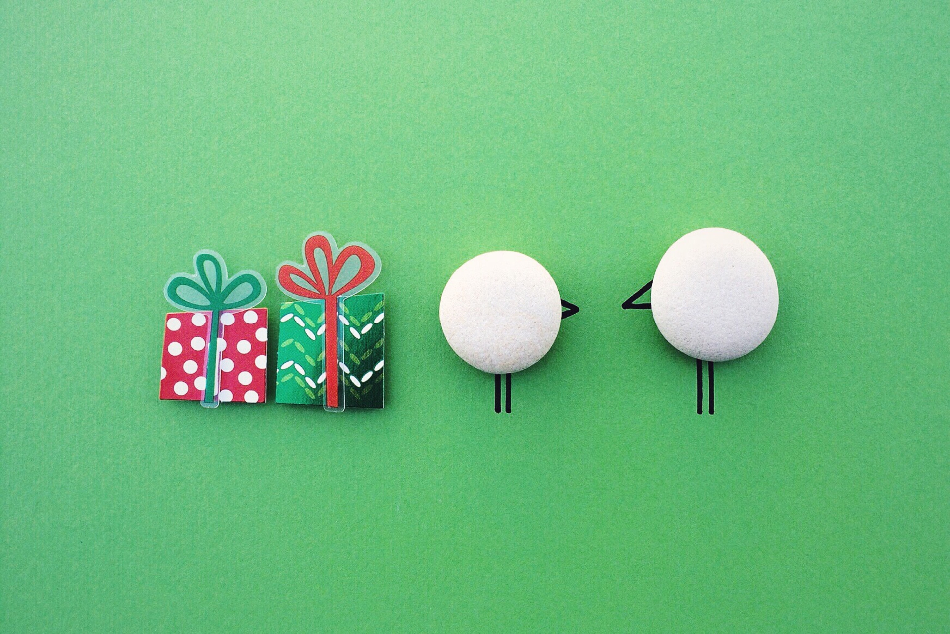 2 white round ornaments