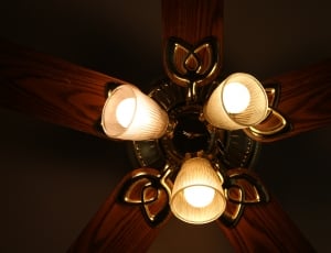 brown wooden 5 blade clear glass ceiling fan and lamp thumbnail