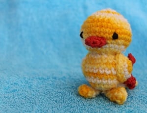 yellow white and red knit chick plush toy thumbnail