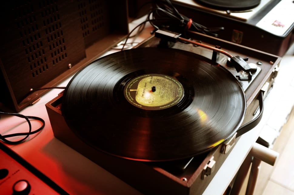 black vinyl record on vinyl record player preview