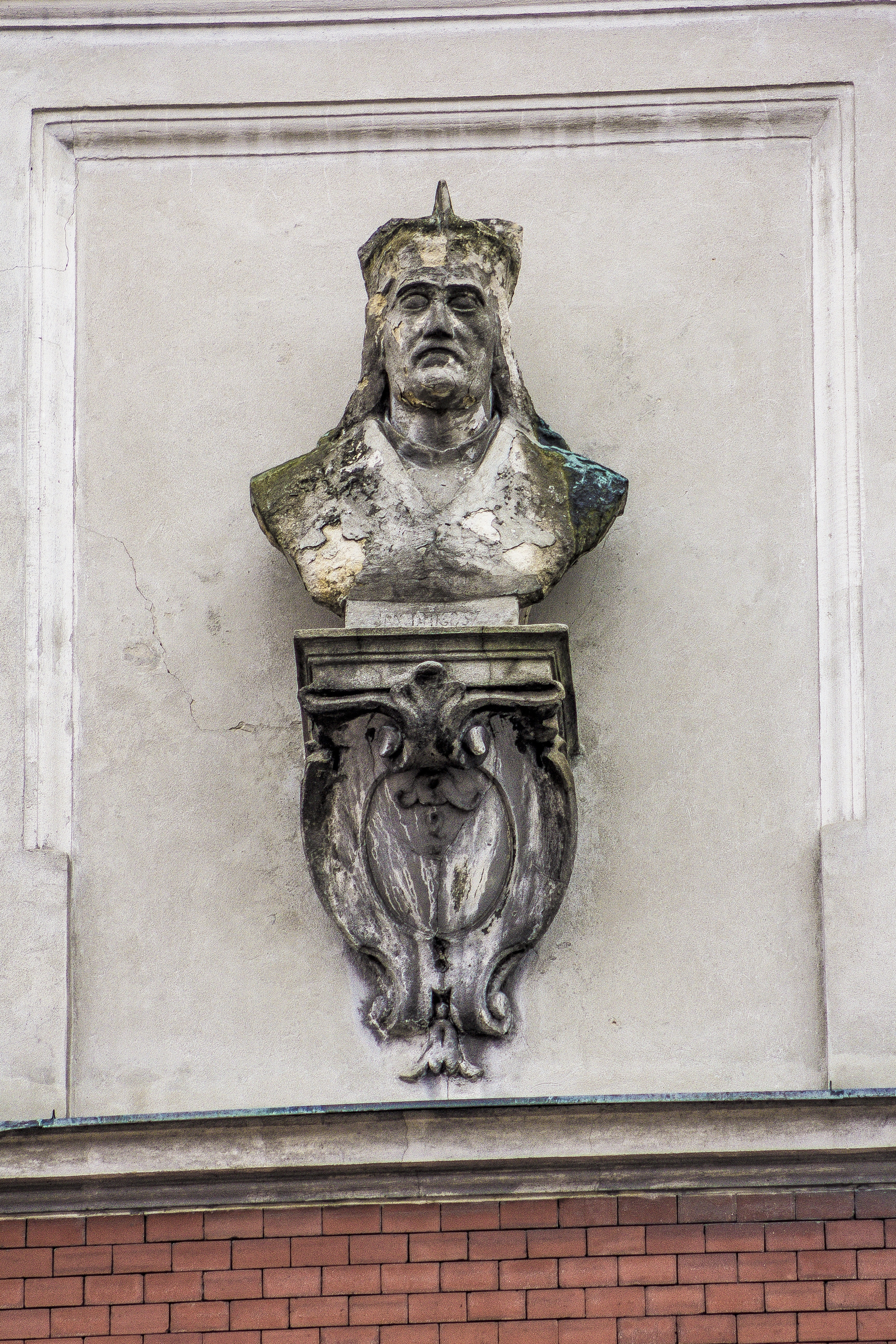 man's concrete head bust