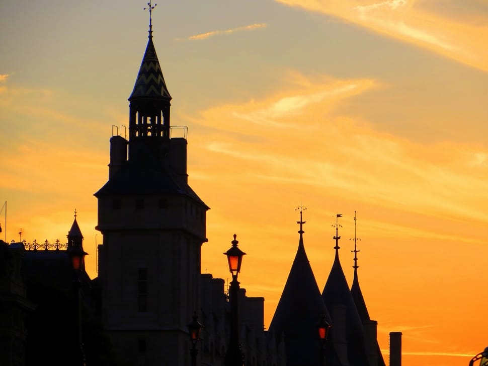 silhouette of towers during golden hour preview