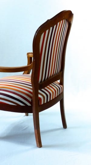 brown wooden framed white red and blue stripped armchair thumbnail