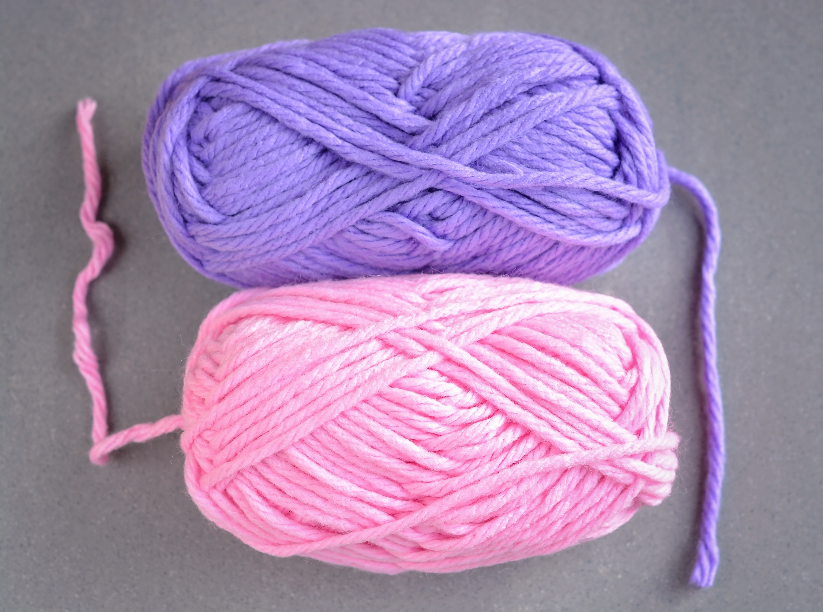 purple and pink yarns