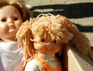 two toddler dolls in a box thumbnail