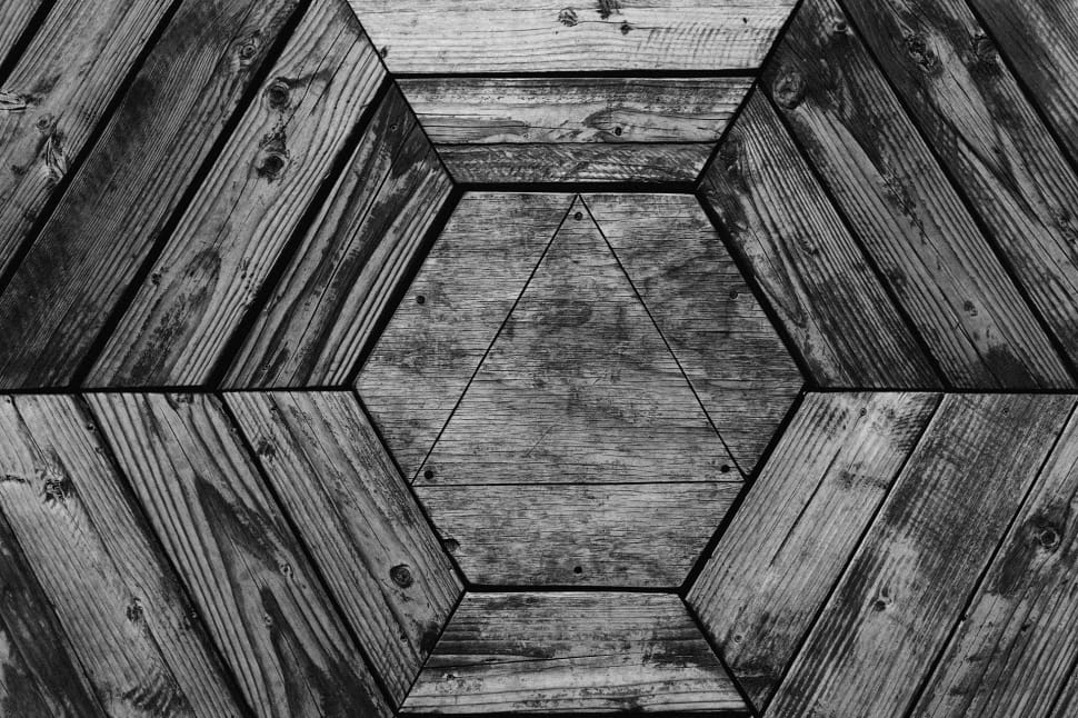 gray and black wooden hexagonal carved surface preview