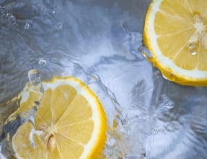 clear water with two lemon garnishes thumbnail