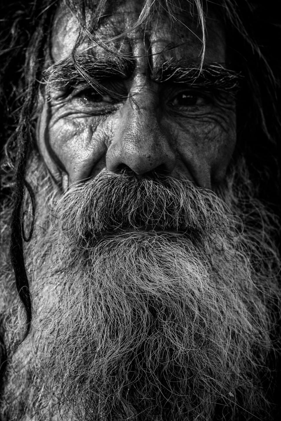 grayscale photo of a man with beard preview