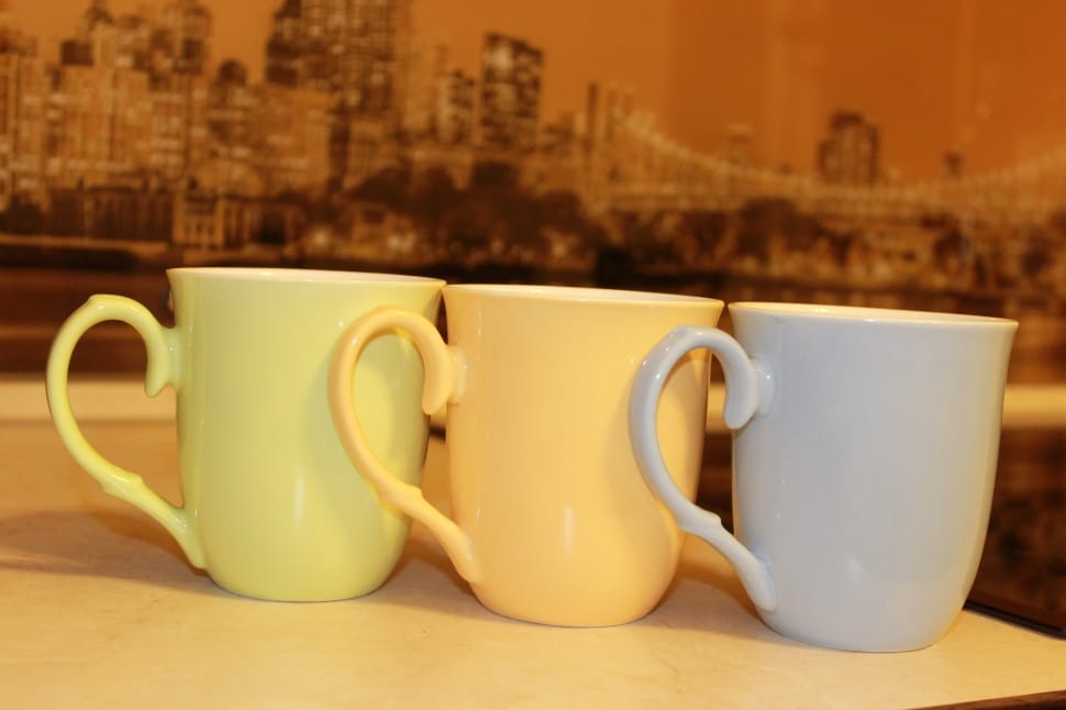 green yellow and gray ceramic mugs preview