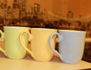 green yellow and gray ceramic mugs thumbnail