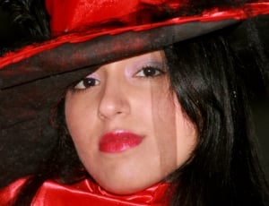woman wearing red and black hat thumbnail