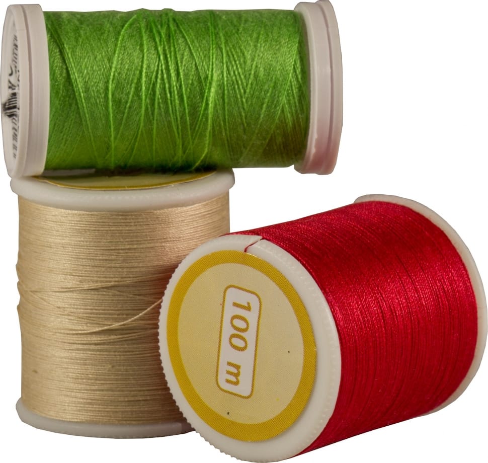 green brown and red thread rolls 100 meters preview