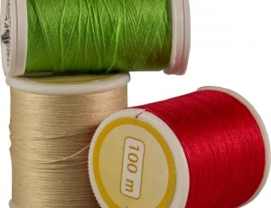 green brown and red thread rolls 100 meters thumbnail