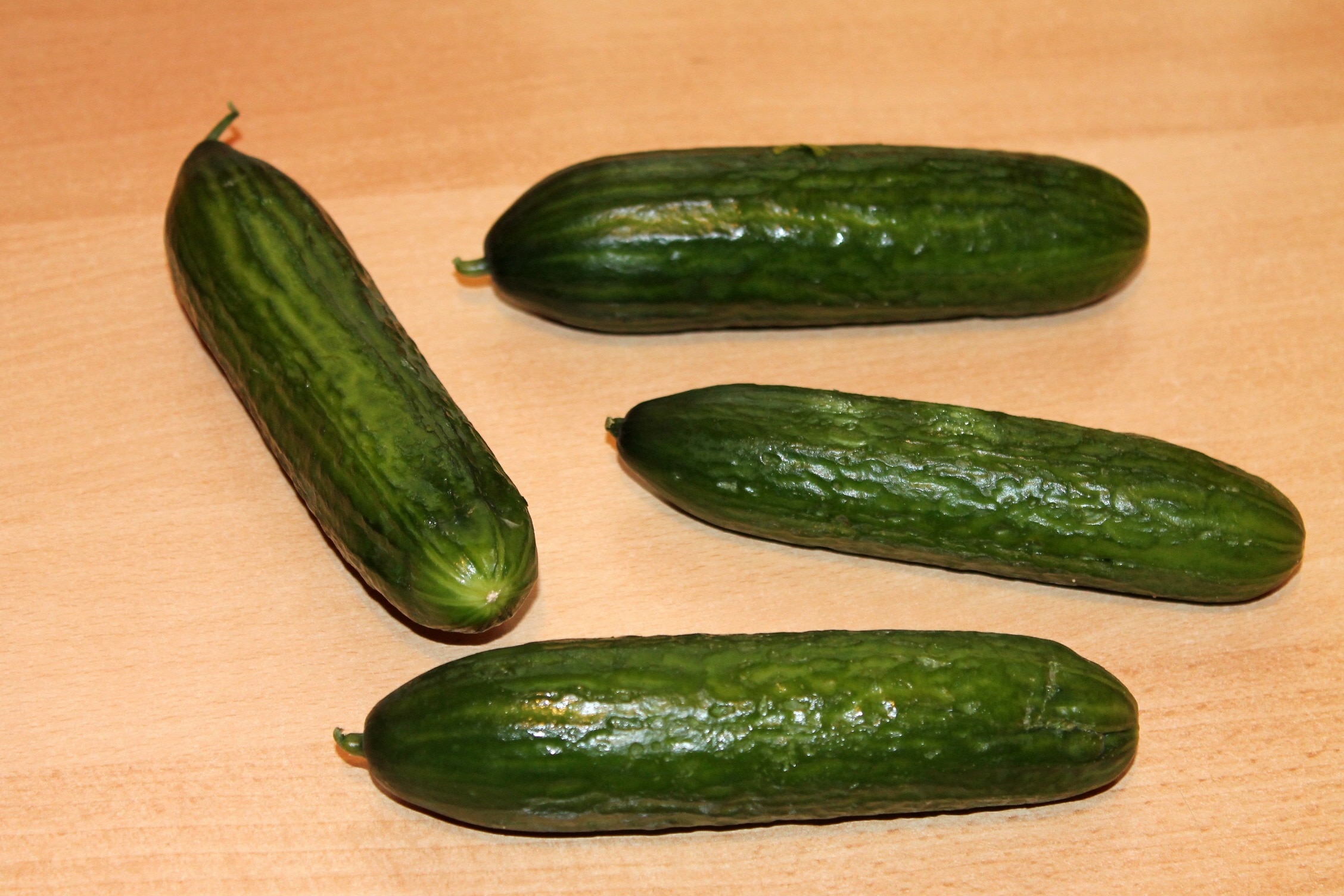 4 green cucumbers