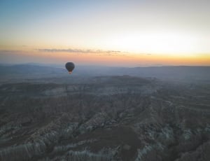 hot air balloon and sunset photo thumbnail