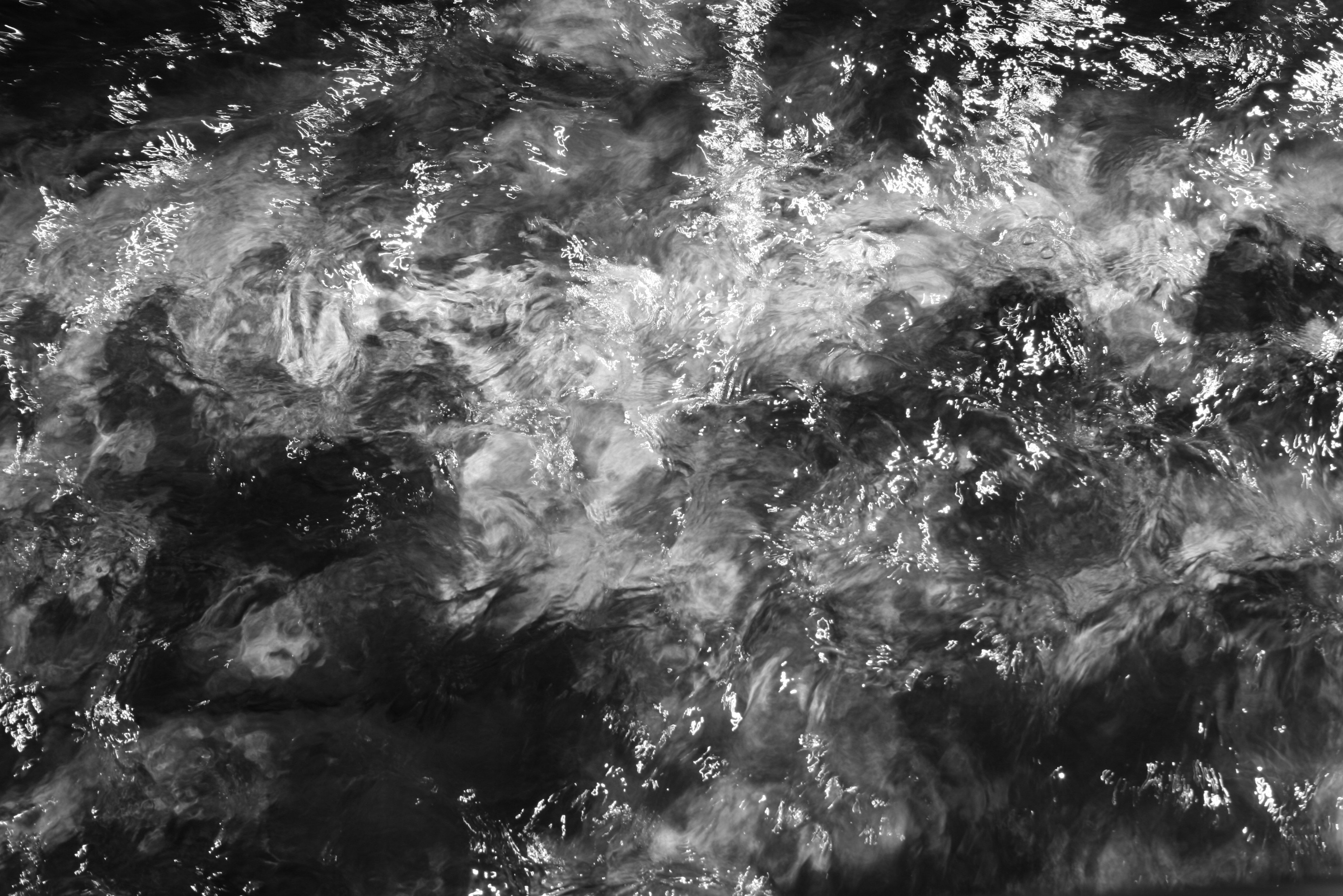 grayscale photo of water surface