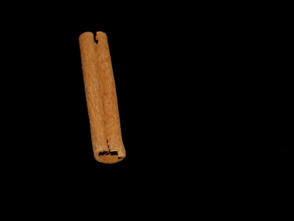 cylindrical brown wooden pipe preview
