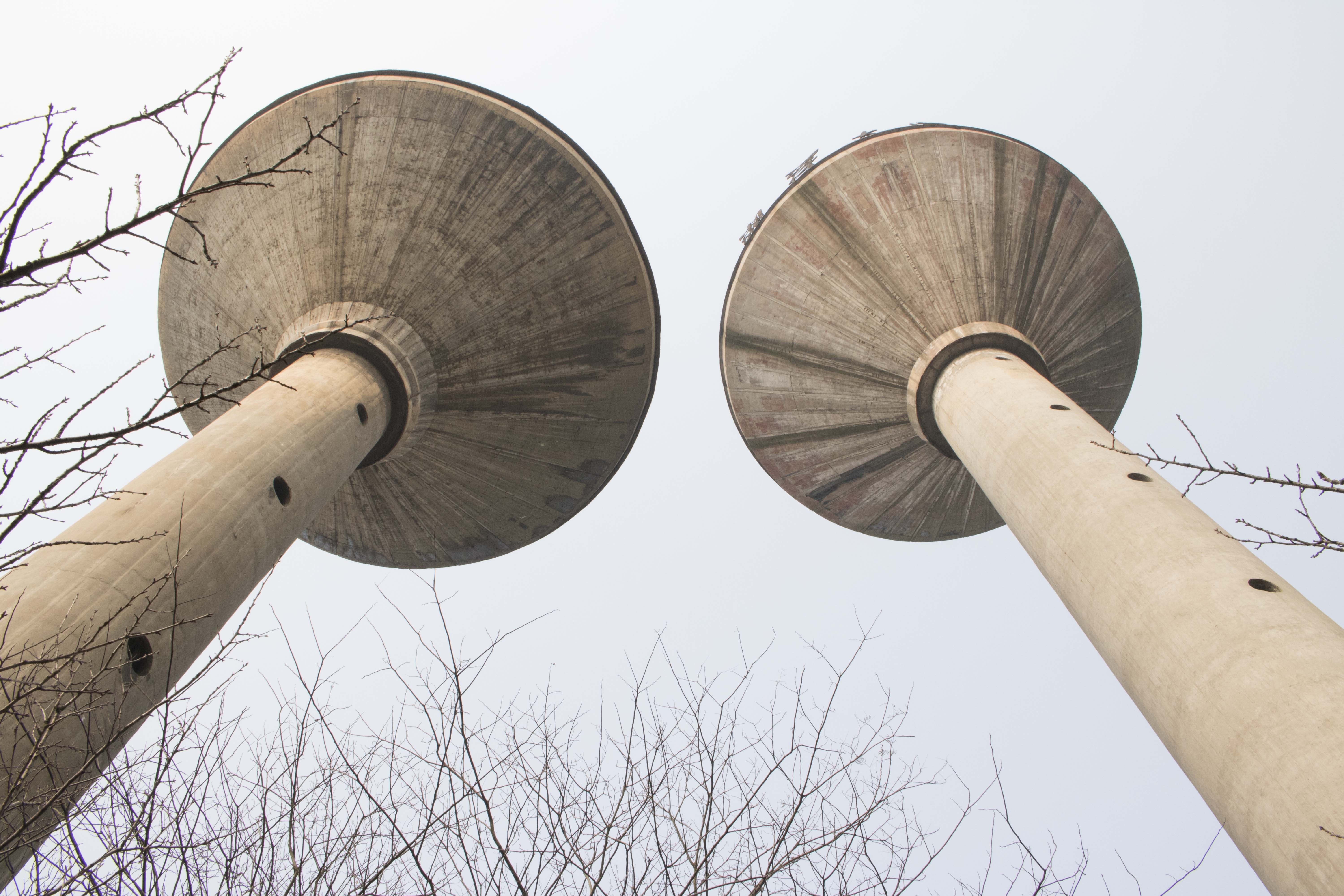 2 gray concrete towers