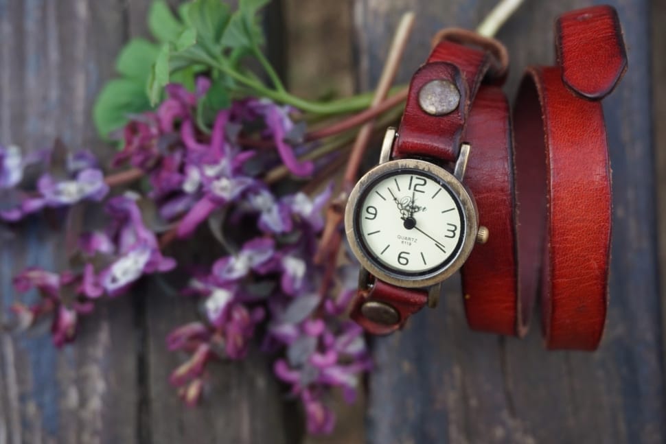 red leather strap silver round frame analog watch preview
