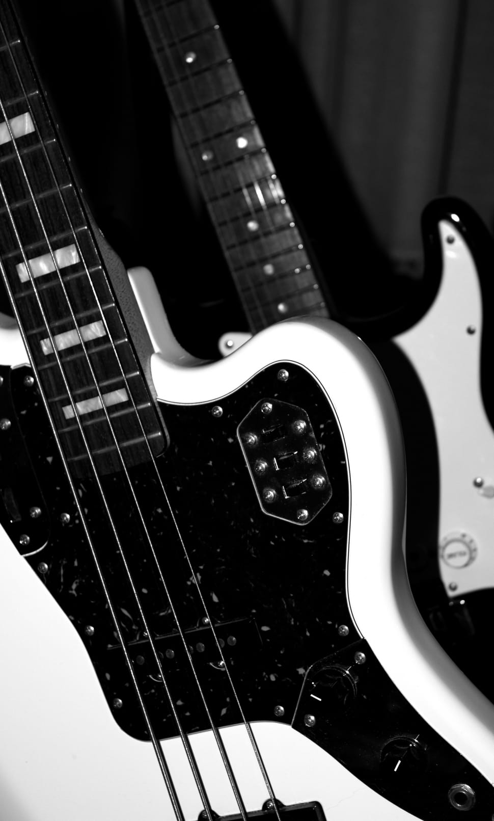 white black and silver 4 stringed electric bass guitar preview