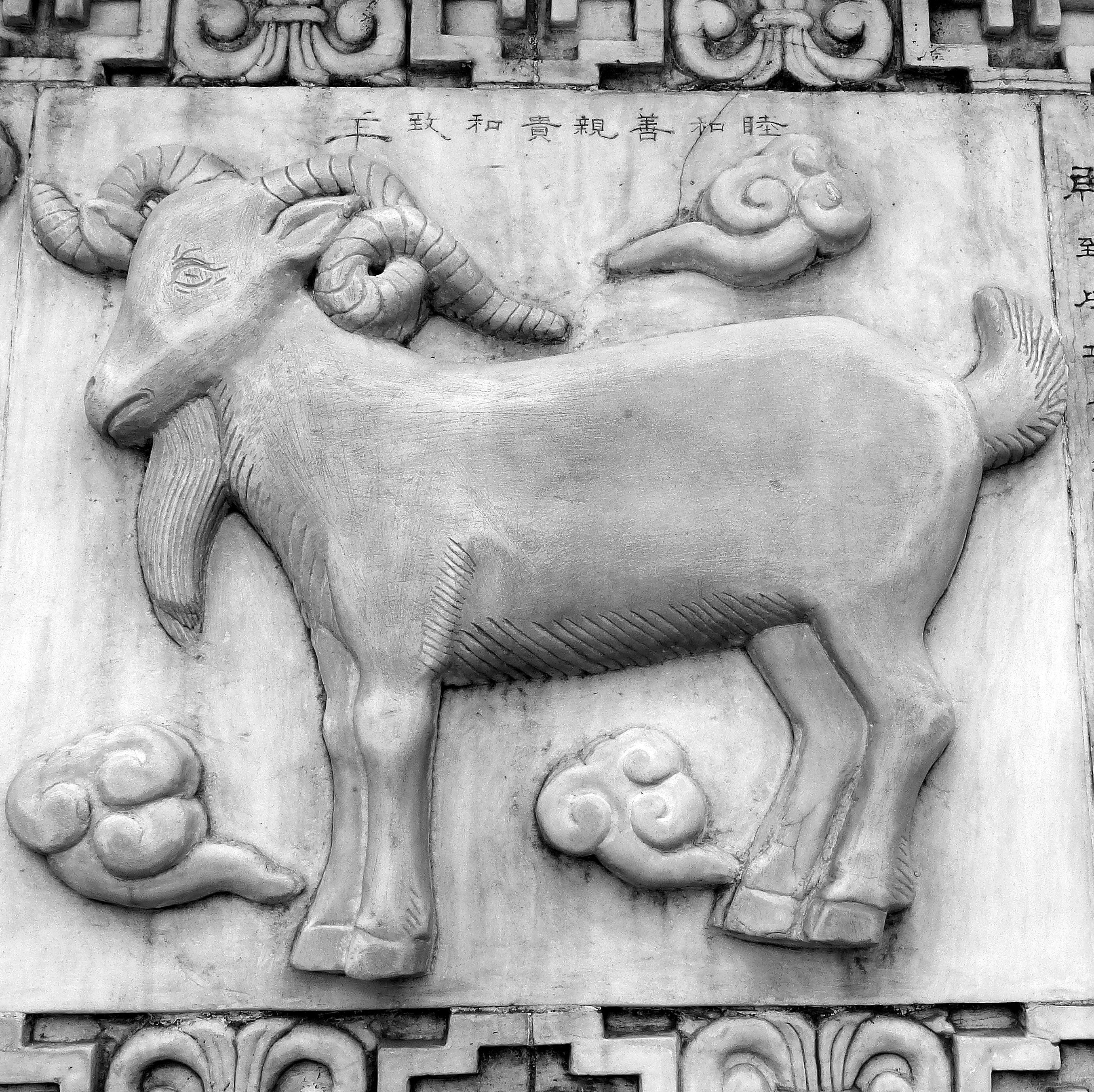 gray goat sculpture